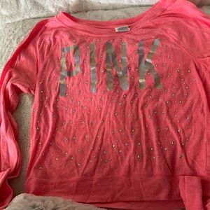 A long-sleeve Pink shirt